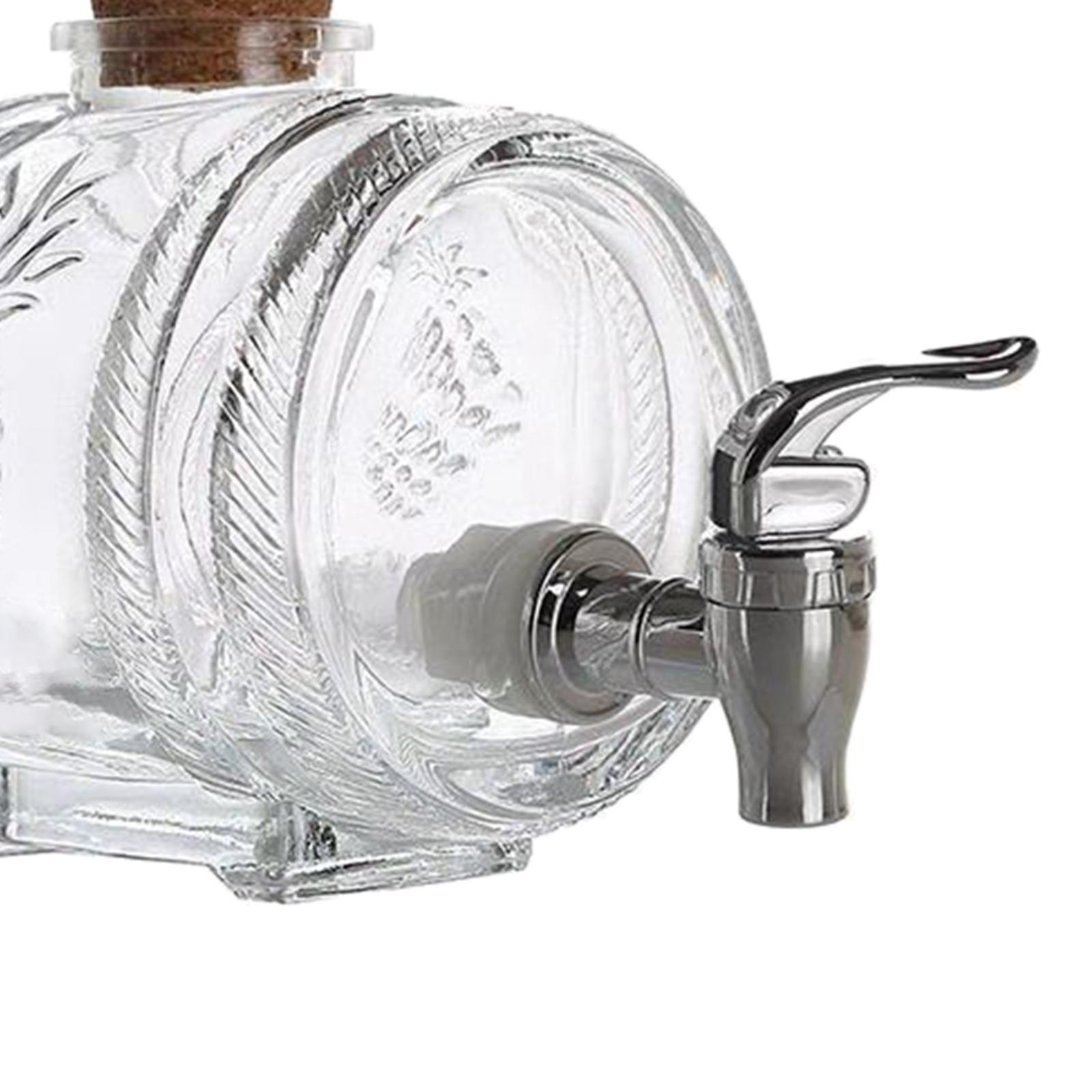 موزع زجاجي فاخر بغطاء من الفلي - مراجعة Wine Beer And Spirits وسعره